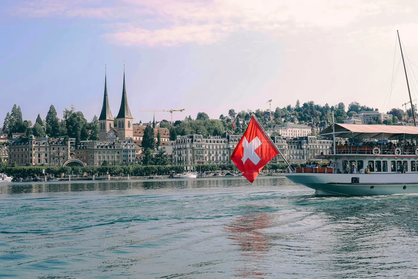 Swiss alpine village with mountain lake